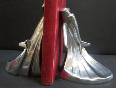 Piper Cub airplane bookends art deco in  polished aluminum is a pair USA