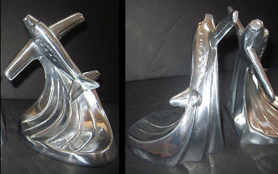 Piper Cub airplane bookends art deco in  polished aluminum is a pair USA