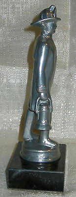 Fireman firefighter with a lantern an Aluminum Figurine