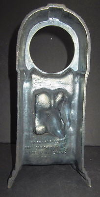 Horses in a barn window in brass metal clock casing USA very tall