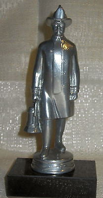 Fireman firefighter with a lantern an Aluminum Figurine