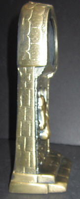 Horses in a barn window in brass metal clock casing USA very tall