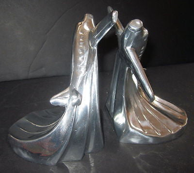 Piper Cub airplane bookends art deco in  polished aluminum is a pair USA