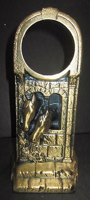 Horses in a barn window in brass metal clock casing USA very tall