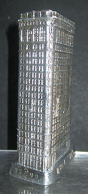 Flat Iron building with a aluminum finish all metal  made in the USA