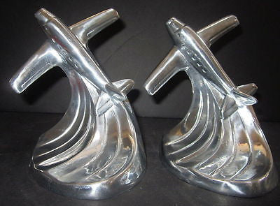 Piper Cub airplane bookends art deco in  polished aluminum is a pair USA