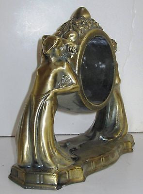 Nymphs two on art deco mantle clock case in antique brass a heavy flappers USA