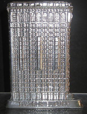 Flat Iron building with a aluminum finish all metal  made in the USA