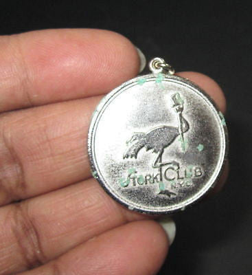 Stork club night club rain check token pendant NYC chrome metal has pitting