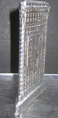 Flat Iron building with a aluminum finish all metal  made in the USA