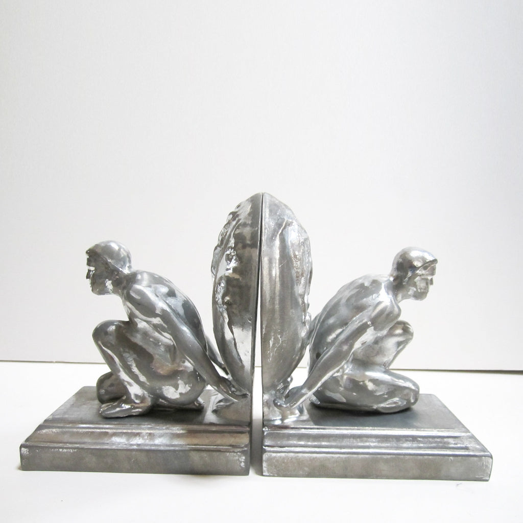 Frankart style Atlas nude male bookends, polished aluminum (pair)