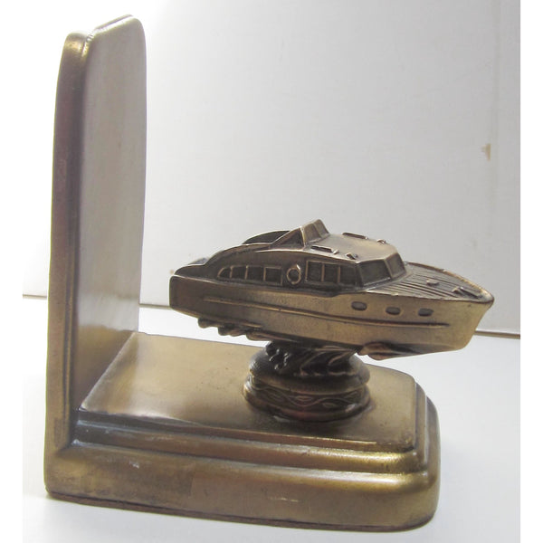 Cabin Cruiser single brass bookend or doorstop, damaged