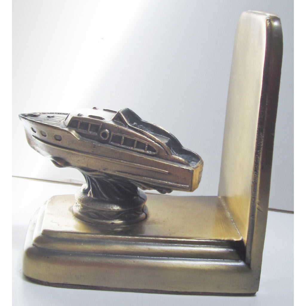 Cabin Cruiser single brass bookend or doorstop, damaged