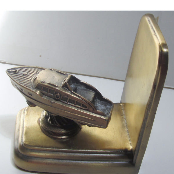Cabin Cruiser single brass bookend or doorstop, damaged