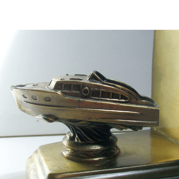Cabin Cruiser single brass bookend or doorstop, damaged