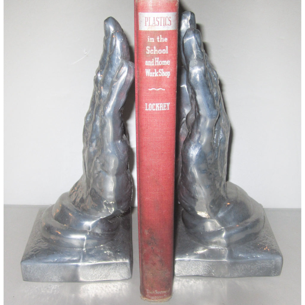 Helping Hands polished aluminum Art Deco bookends (pair)