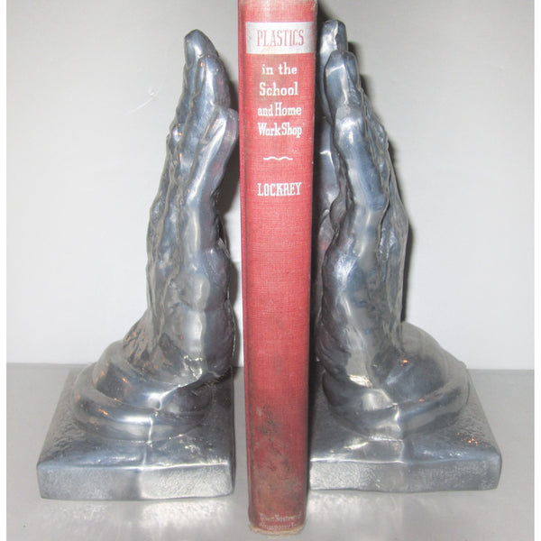 Helping Hands polished aluminum Art Deco bookends (pair)