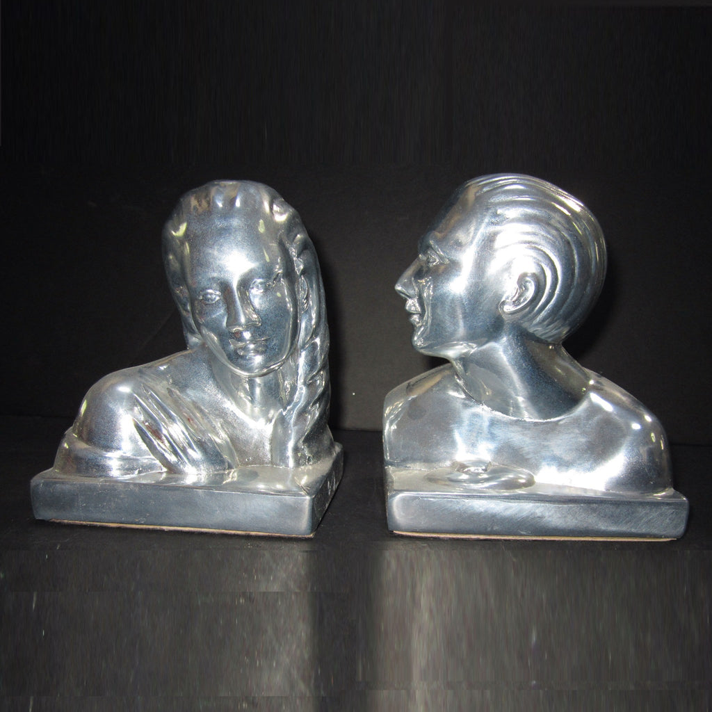 Art Deco Man and Woman bookends, polished aluminum (pair)