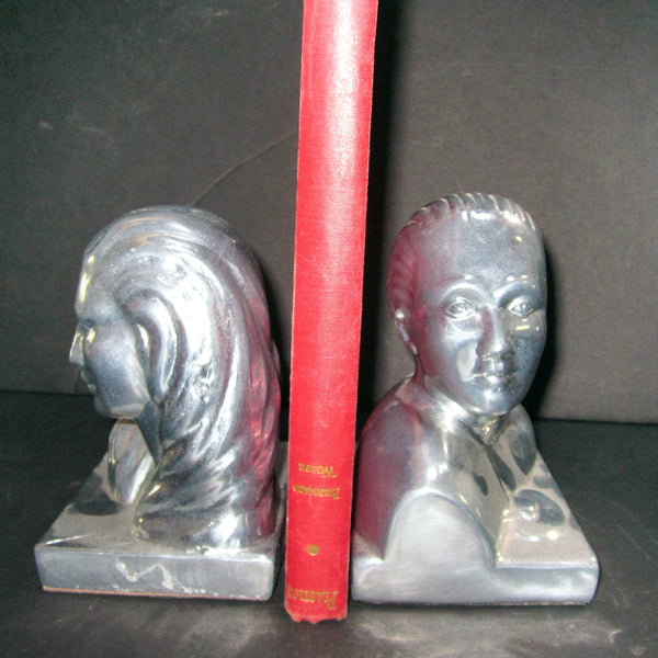 Art Deco Man and Woman bookends, polished aluminum (pair)