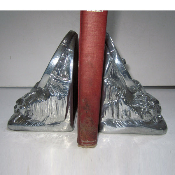 Wagon Wheels Across the Desert bookends, aluminum (pair)