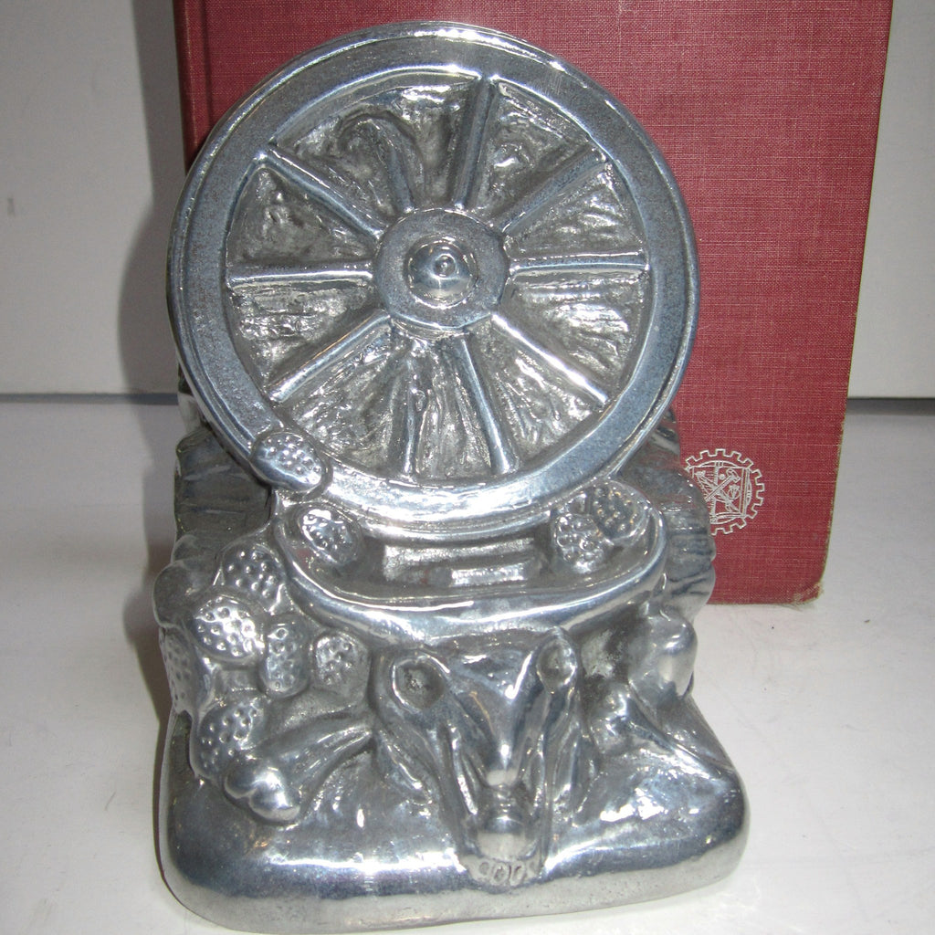 Wagon Wheels Across the Desert bookends, aluminum (pair)